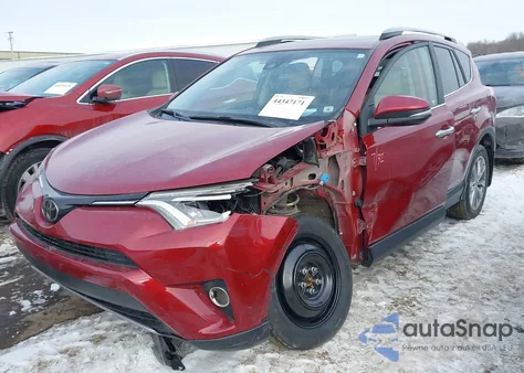 2018 Toyota Rav4 Limited z USA, uszkodzony, nr VIN JTMDFREV6JD240544